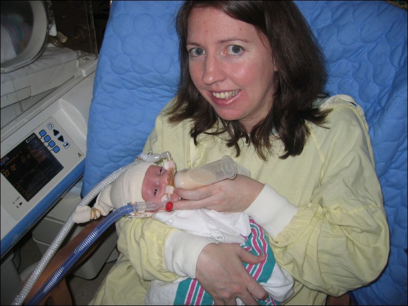 Meghan feeding Sebastian